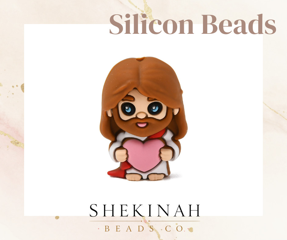 Bead focal de silicón estilo Jesús cargando un corazón para decorar bolígrafos y accesorios cristianos.