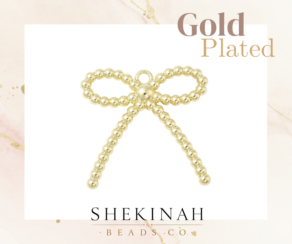 Charm lazo dorado estilo gold plated con diseño de bolitas para bisutería
