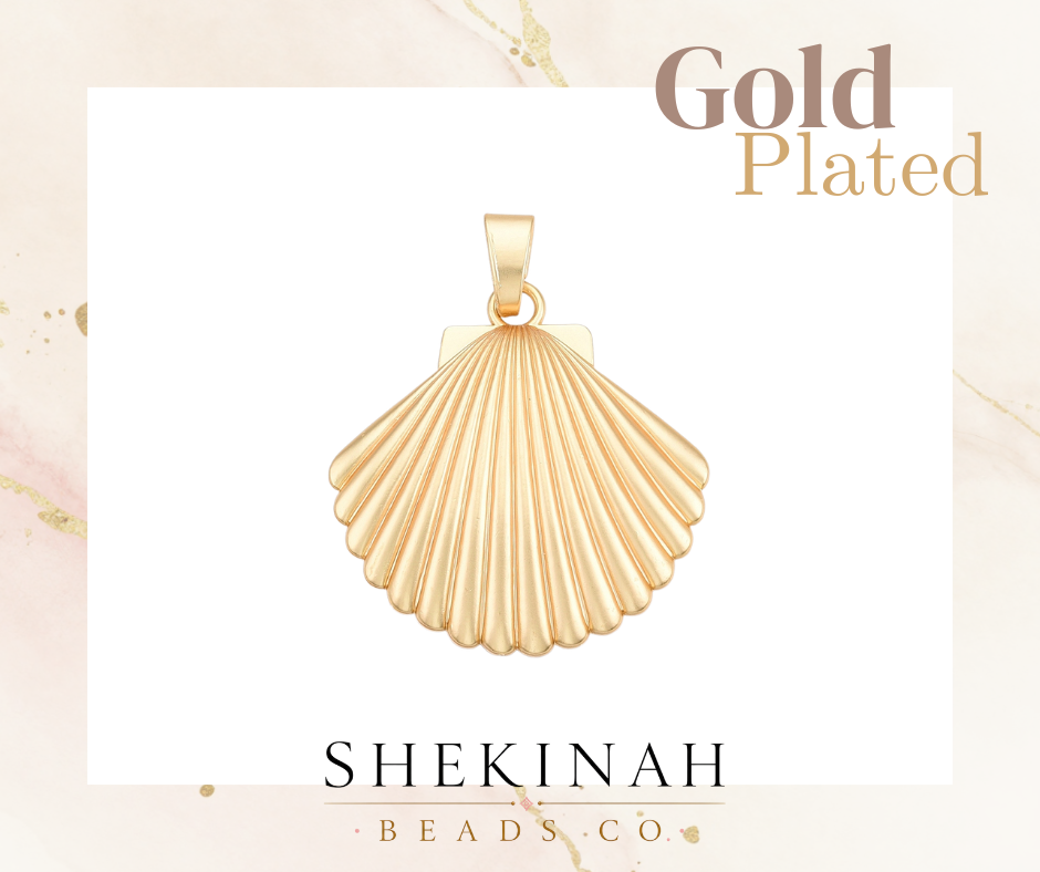 Dije dorado estilo gold plated en forma de concha para bisutería