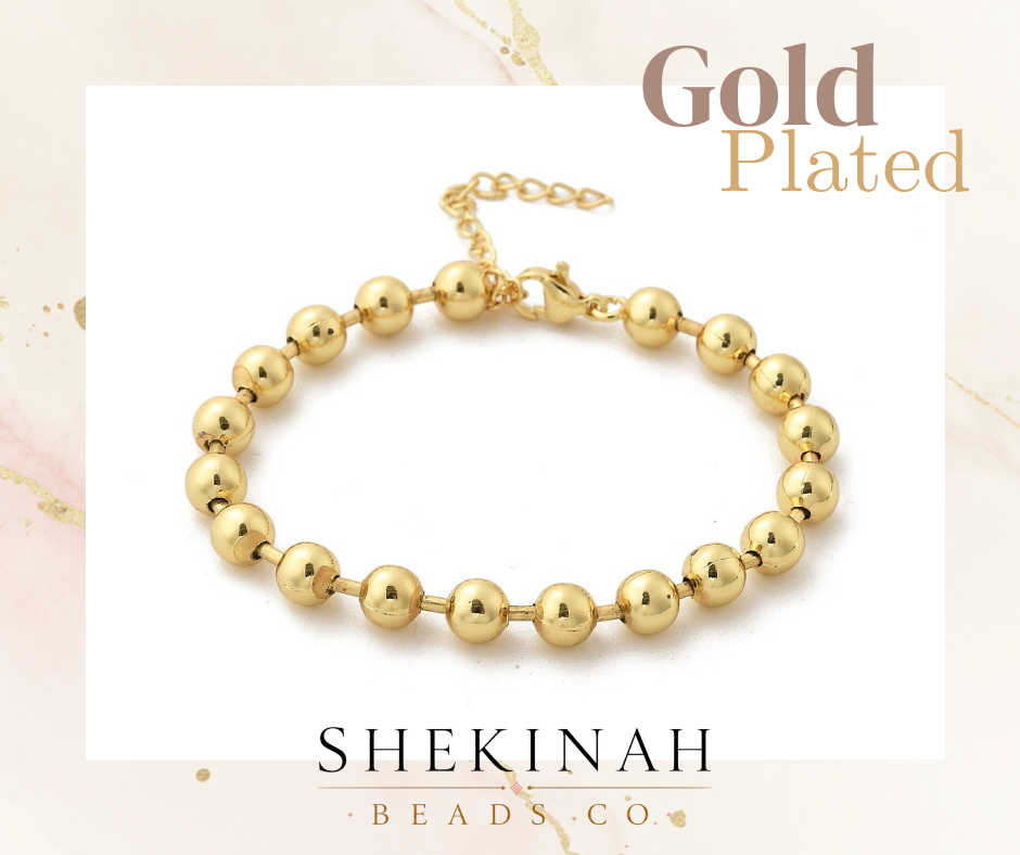 Pulsera dorada de bolitas estilo gold plated con broche y extensión para bisutería