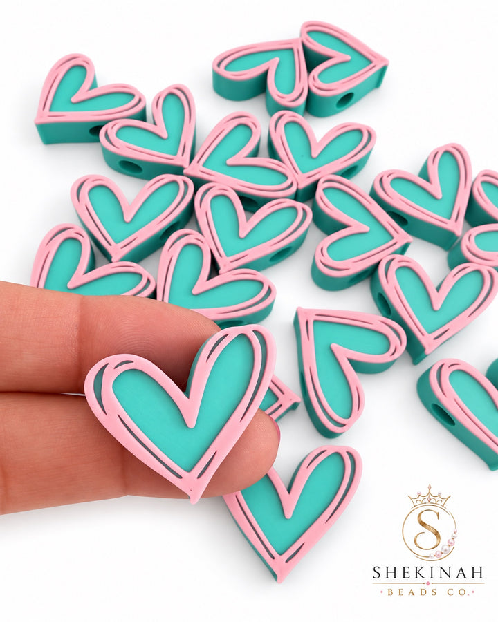 Bead 3D corazón turquesa con borde rosa, hueco horizontal de 5 mm