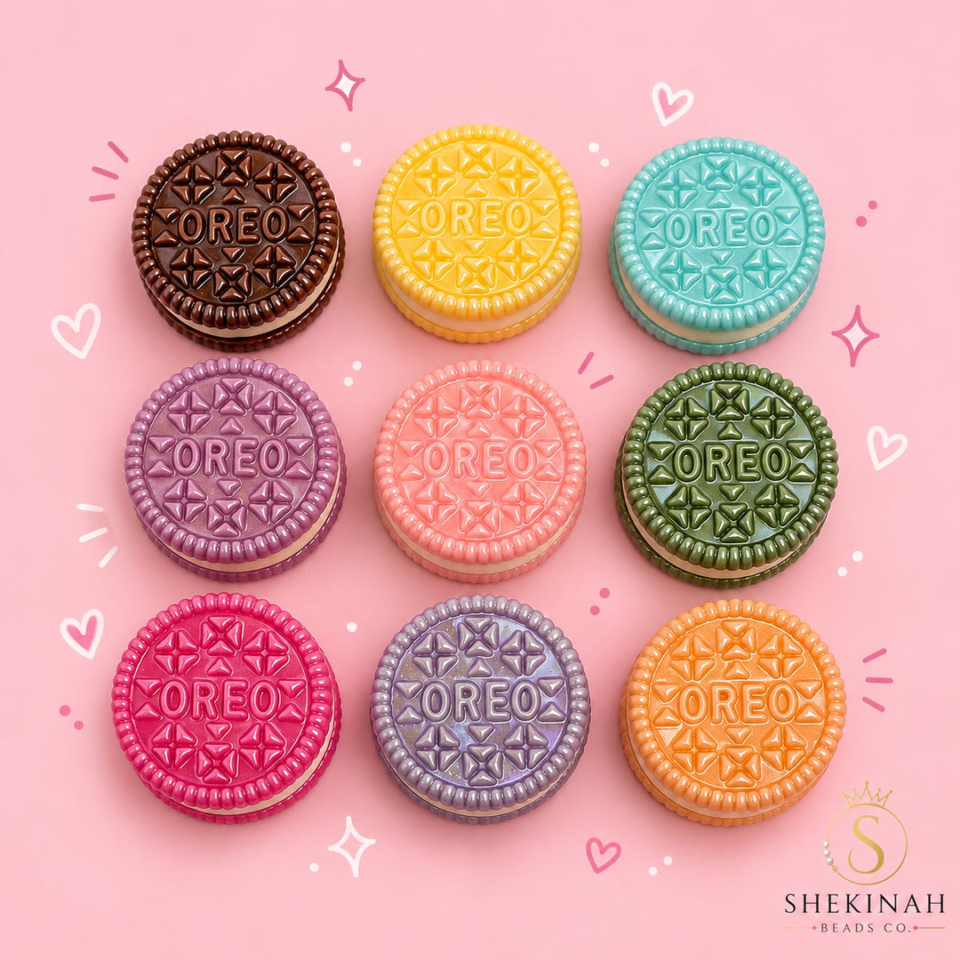 Beads Oreo de 21 mm con hueco de 2 mm en colores surtidos