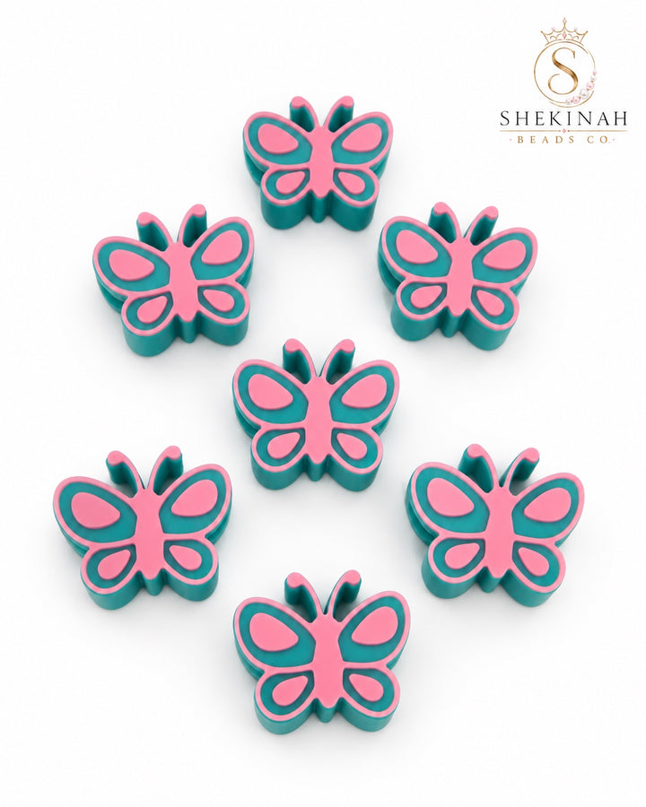 Charm 3D mariposa azul con rosa