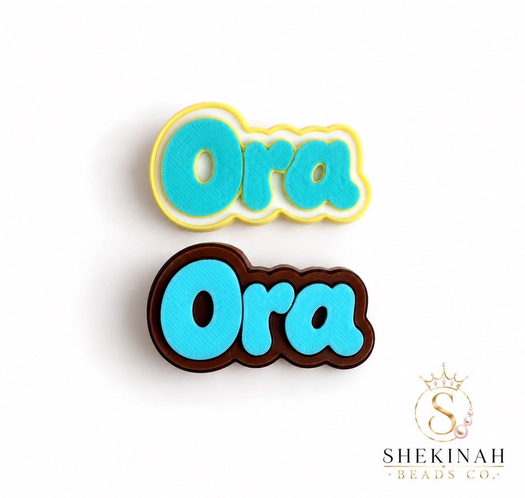 Ora Chunky Charm 3D en combinaciones amarillo, blanco, turquesa y brown