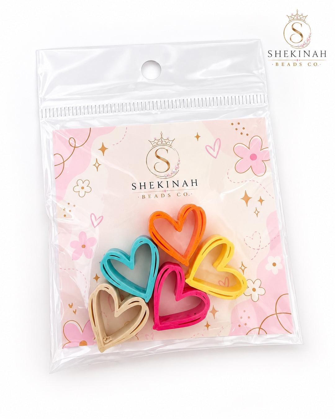 Set de 5 charms 3D corazones outline colores mixtos